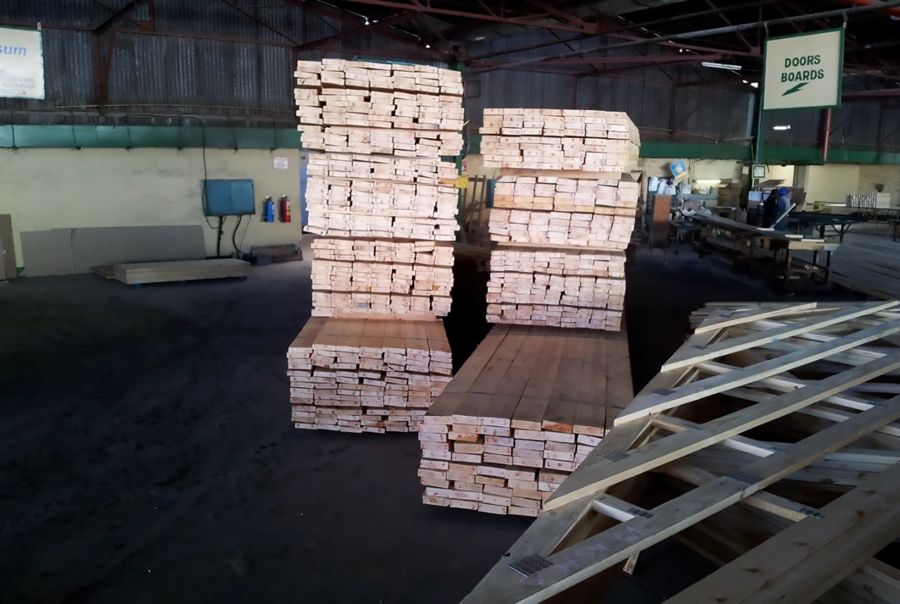 Graded timber stacked in the Bulk Timber Supplies store